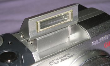 Olympus C-740 Ultra Zoom: fotoaparát s rodokmenem