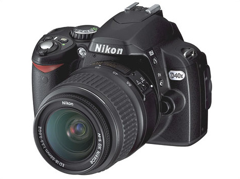 Olympus P-1 a Nikon D40X