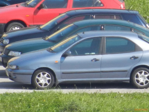 Nikon Coolpix S9100: rudý bojovník